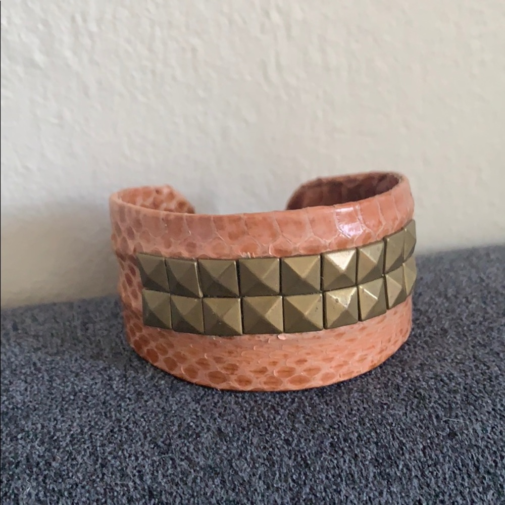 Brand new snakeskin cuff with studs